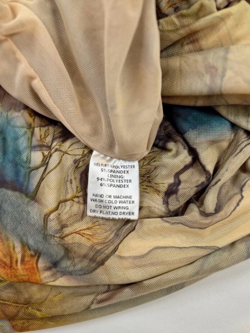 Blanc Abstract Lined Mesh Flare Print Y2K
Size L - Picture 5 of 9